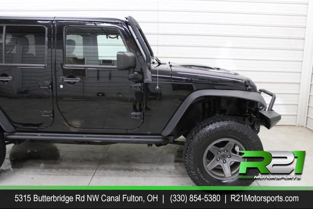 2013 Jeep Wrangler Unlimited Sahara MOAB 4WD for sale at R21 Motorsports