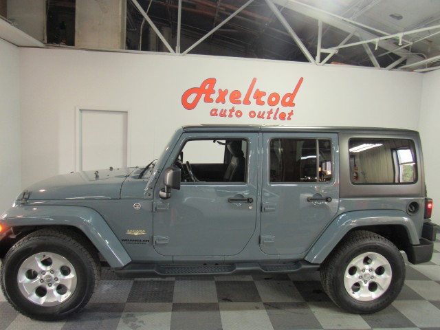 2015 Jeep Wrangler Unlimited Sahara 4WD | For sale at Axelrod Auto Outlet |  View other SPORT UTILITY 4-DRs on the Axelrod Auto Outlet website